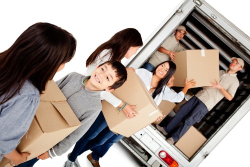 Trained moving staff handling furniture with care