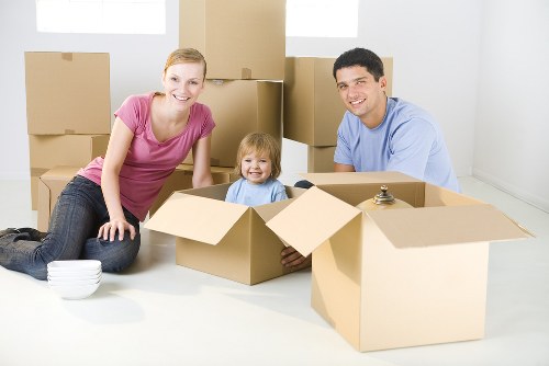 Delivery van and moving team preparing equipment safely