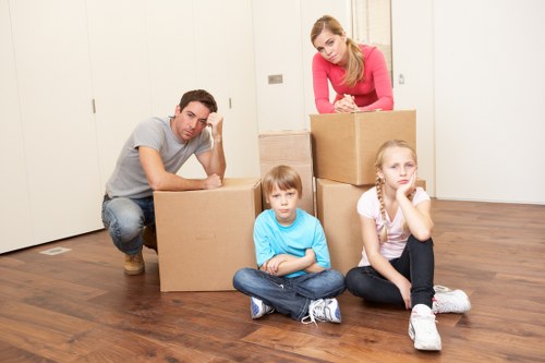 Packed office boxes and furniture ready for relocation