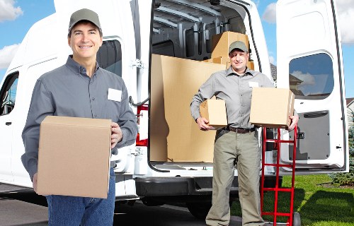 Mover wearing PPE while protecting property during a move