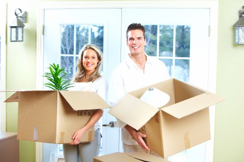 Packed moving boxes and furniture ready for a Cranham home move