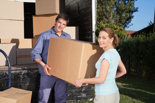 Loading furniture into a hired removal truck in Cranham